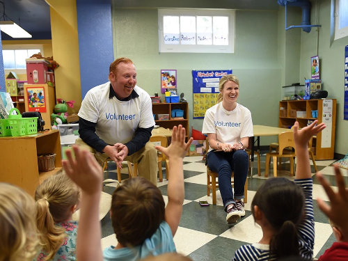 Alcon Volunteers in a classroom