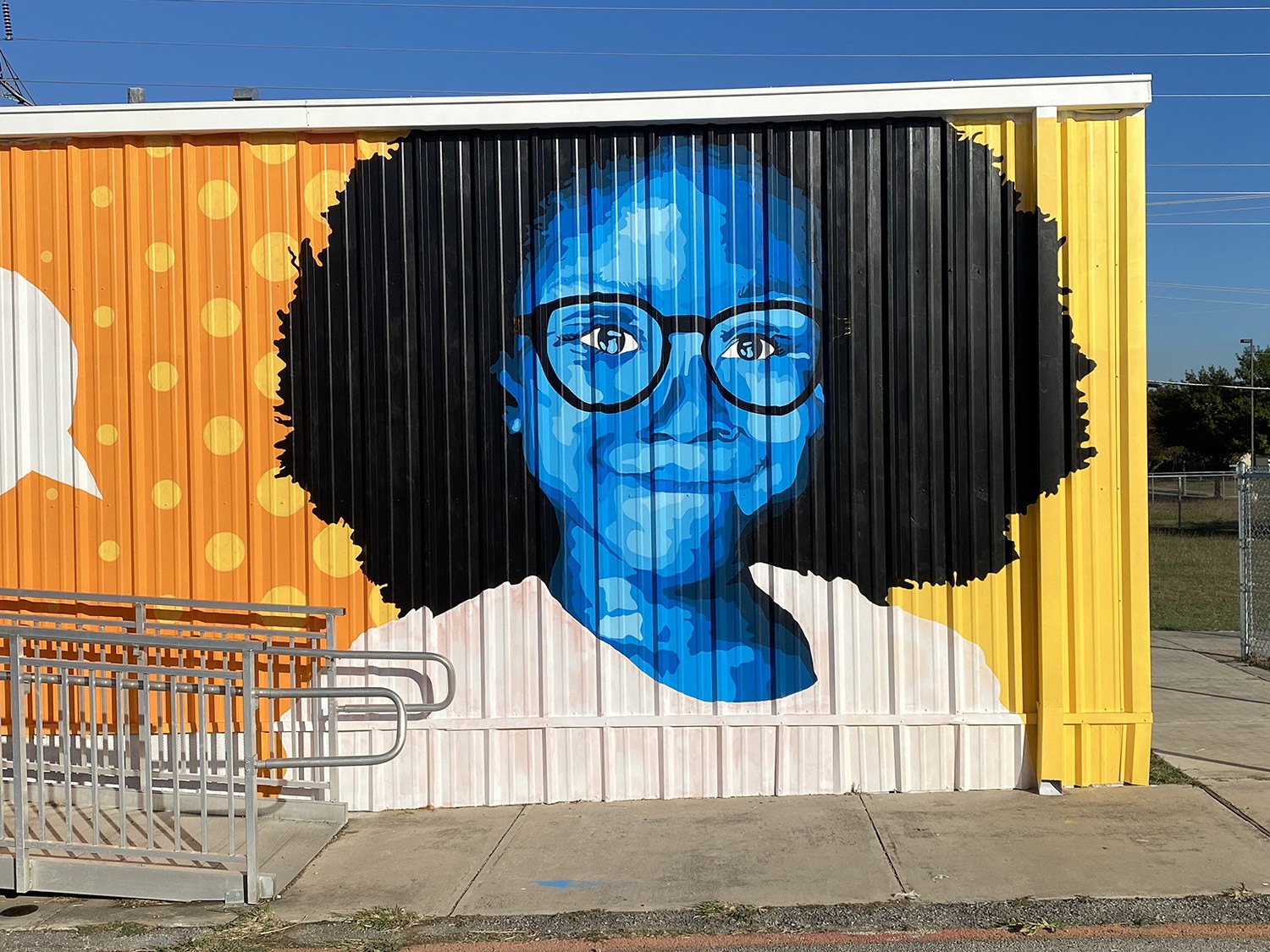 Mural of a girl wearing glasses