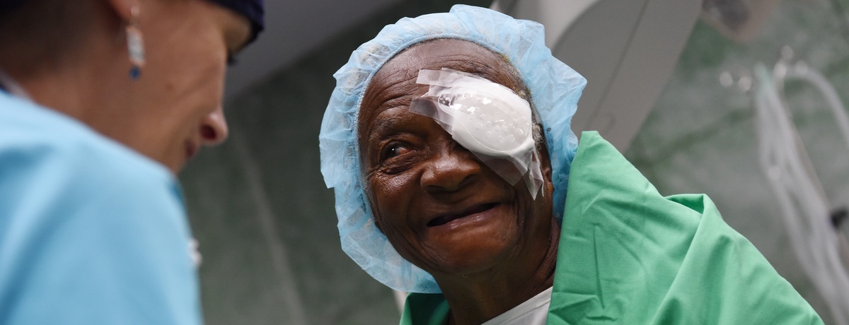 Older woman with eye patch post surgery